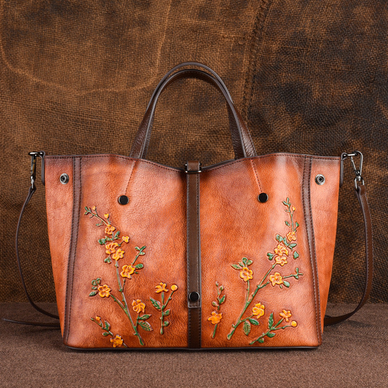 Hand-embossed and painted fashion leather bag