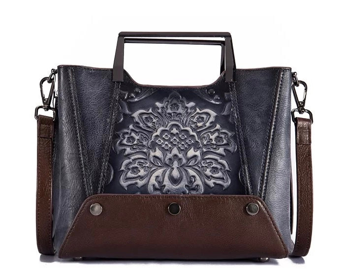 Hand-embossed painted leather bag