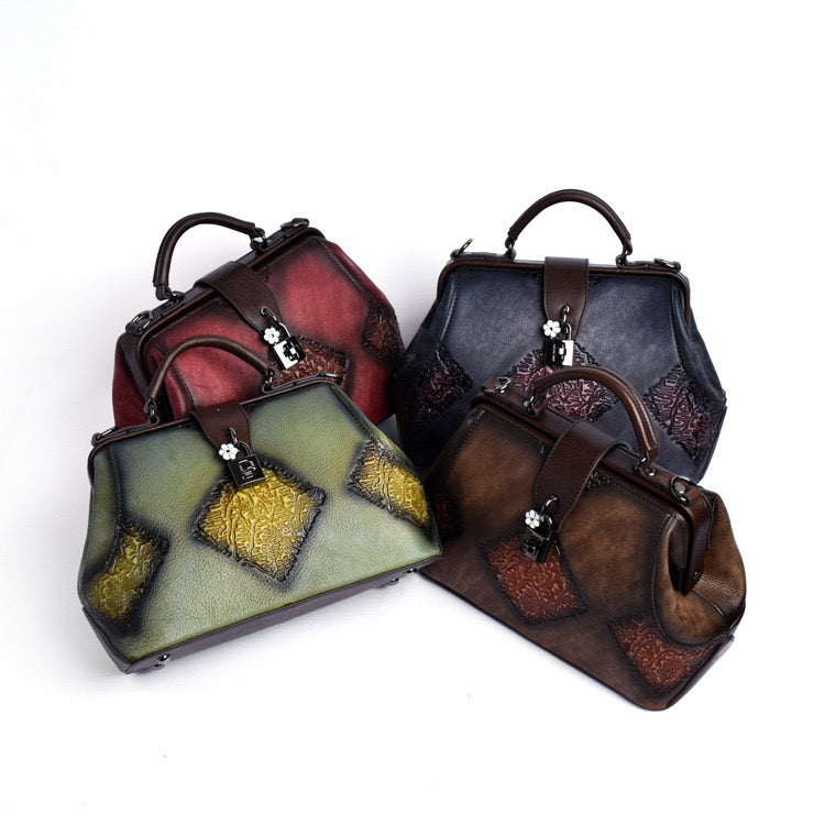 Hand-embossed painted leather bag